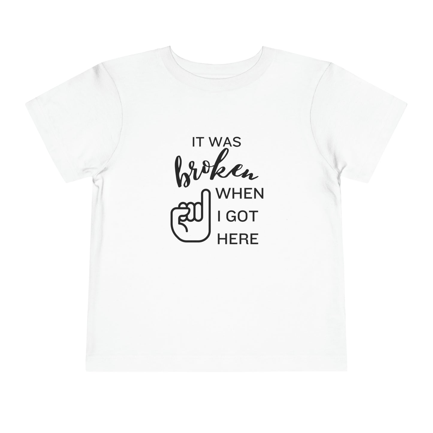 Comfortable funny graphic toddler tee stating 'It was broken when I got here' in color white
