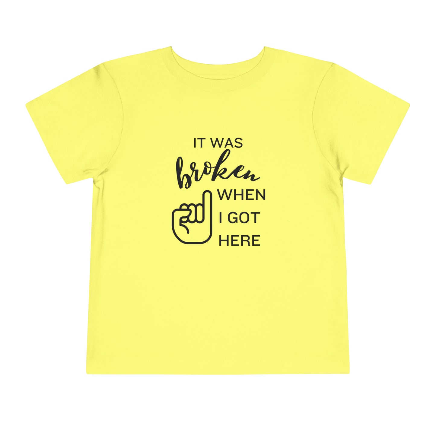 Comfortable funny graphic toddler tee stating 'It was broken when I got here' in color yellow