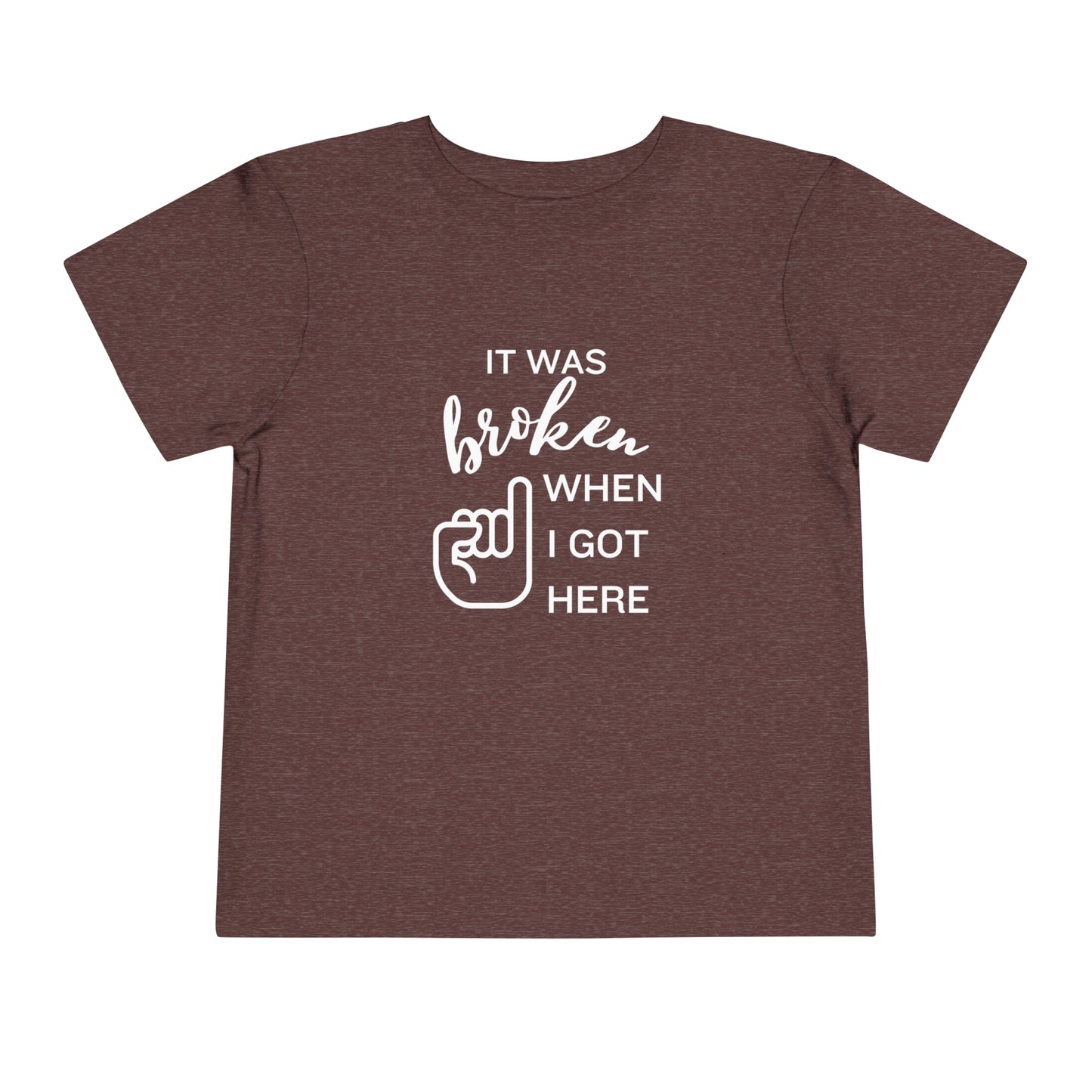 Comfortable funny graphic toddler tee stating 'It was broken when I got here' in color maroon heather