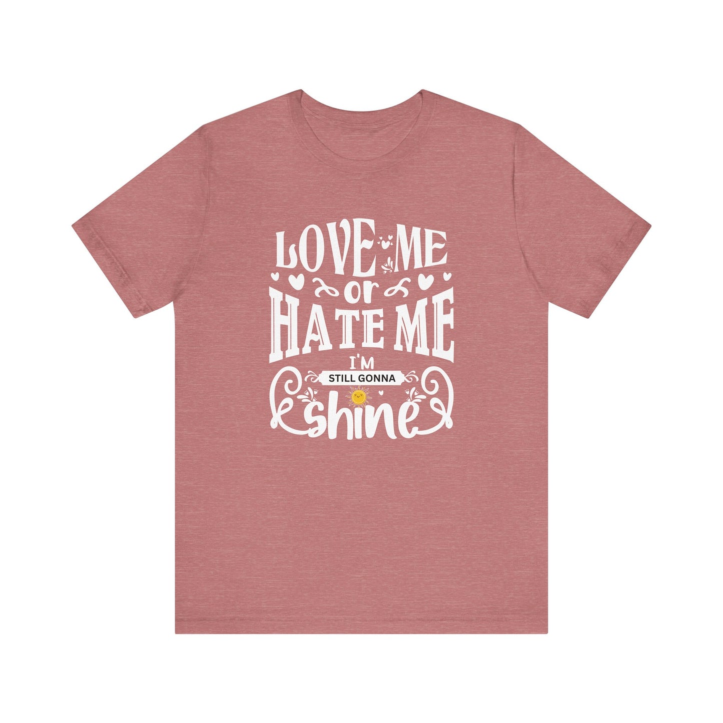Women's good vibes graphic tee stating 'Love me or hate me, I'm still gonna shine' in color heather mauve