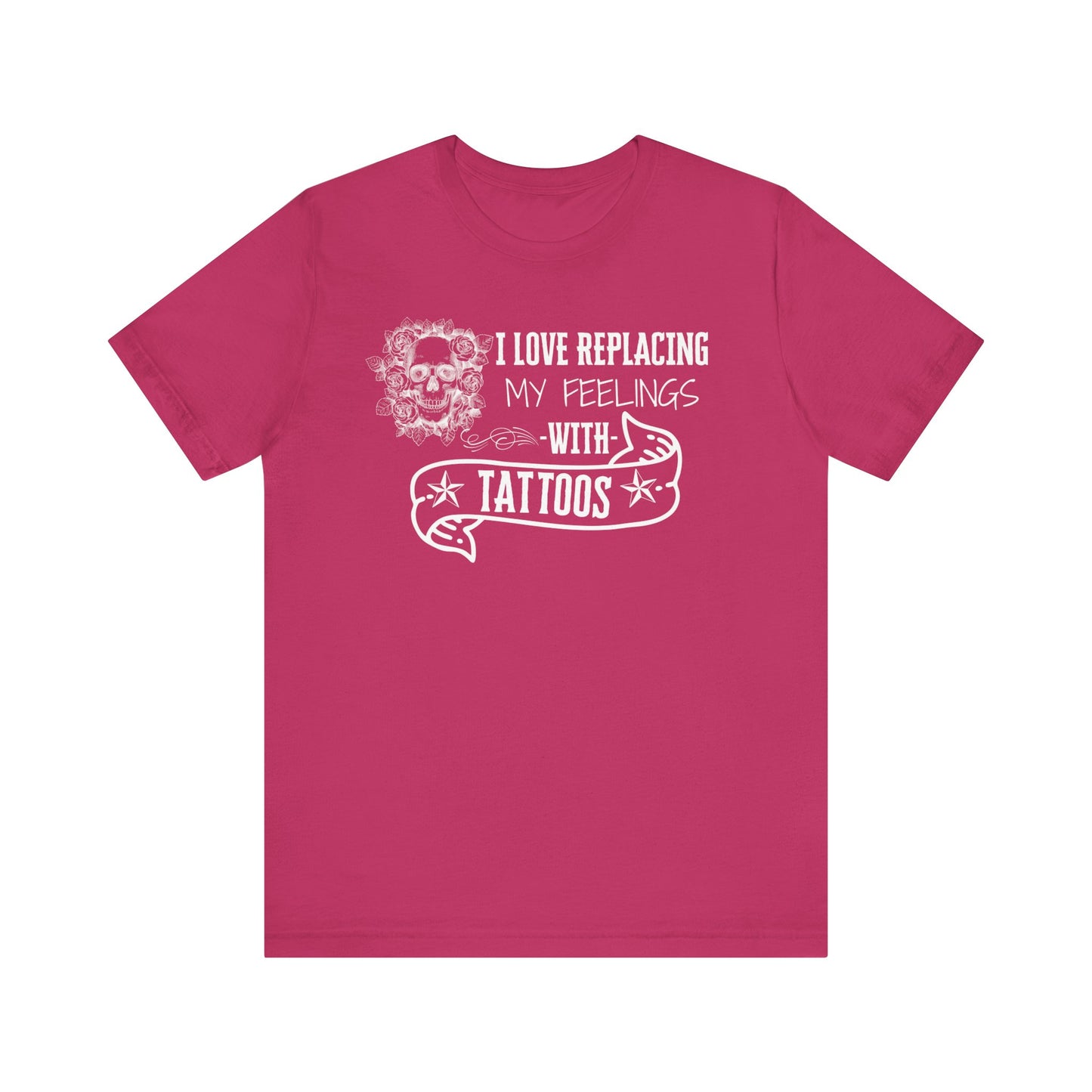 A sarcastic graphic tee stating 'I love replacing my feelings with tattoos' in color berry