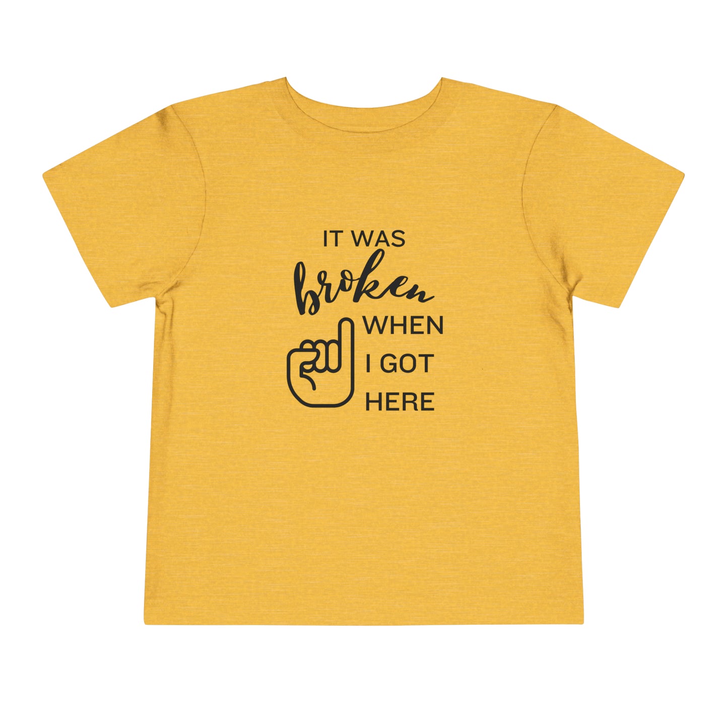 Comfortable funny graphic toddler tee stating 'It was broken when I got here' in color golden yellow heather