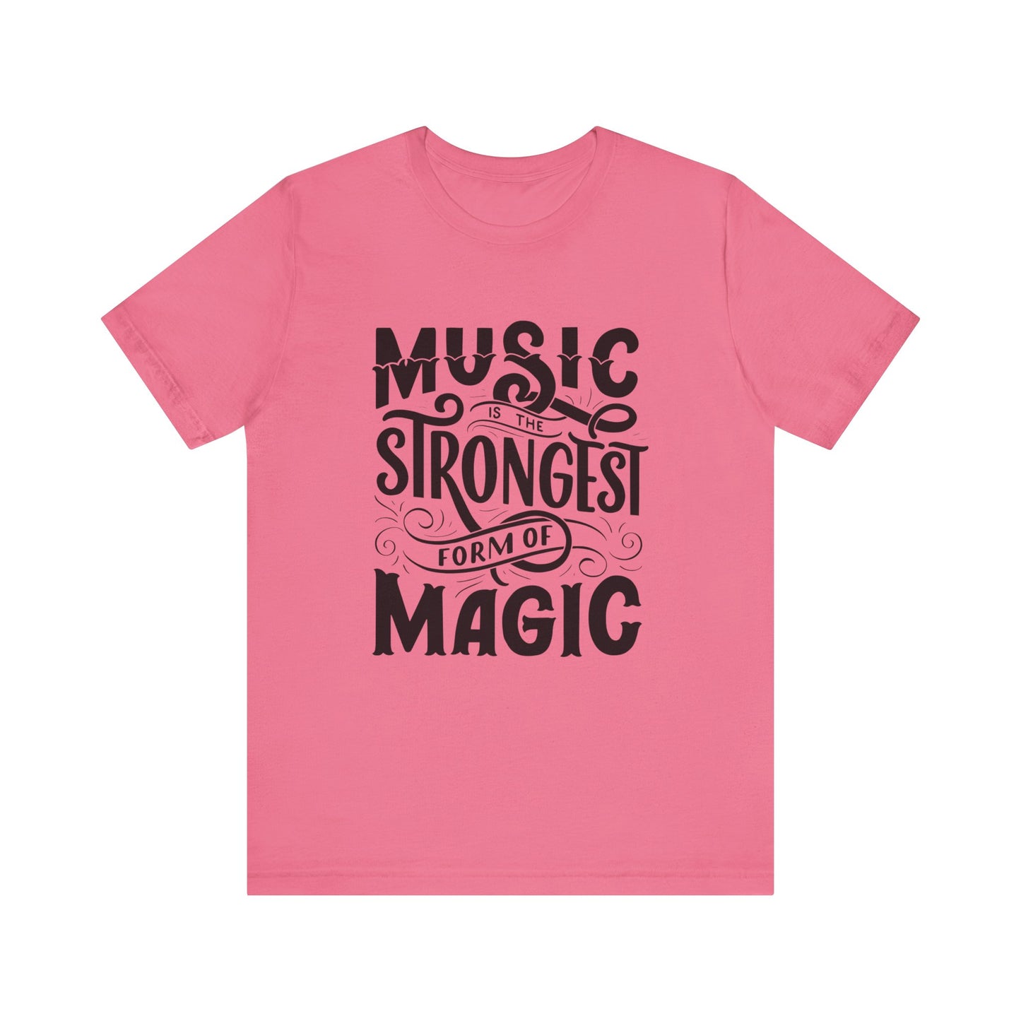 A comfortable good vibes tee stating 'Music is the strongest form of magic' in color charity pink