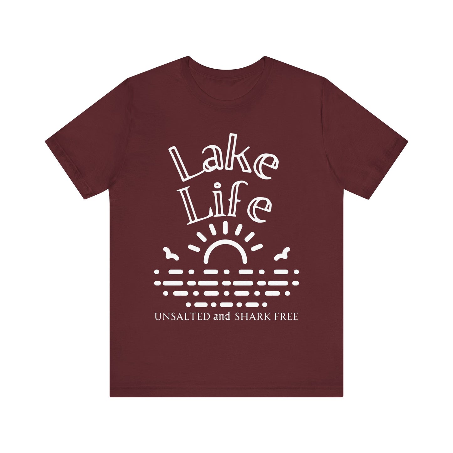 Funny t-shirt stating 'Lake Life Unsalted and Shark Free' in color maroon