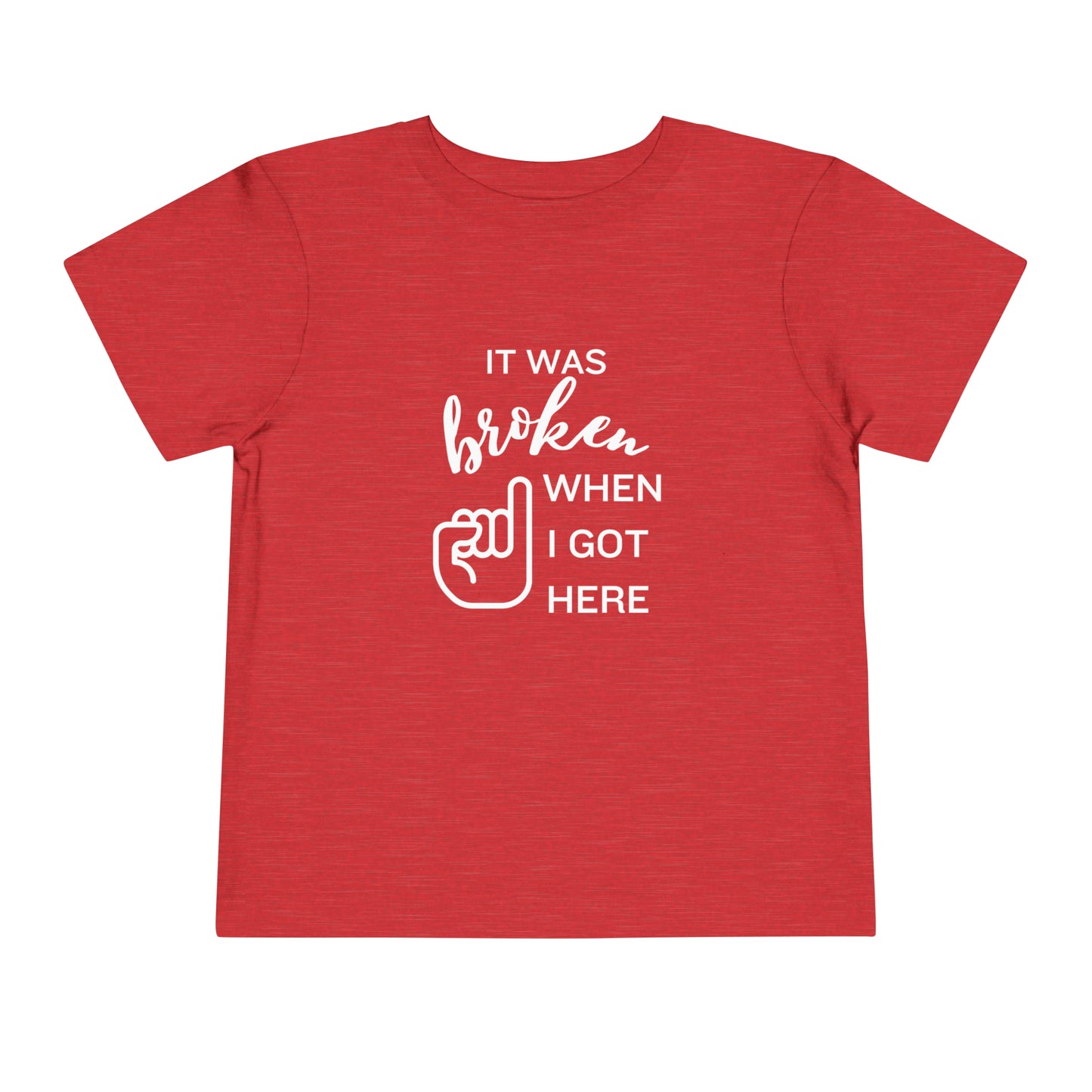 Comfortable funny graphic toddler tee stating 'It was broken when I got here' in color heather red