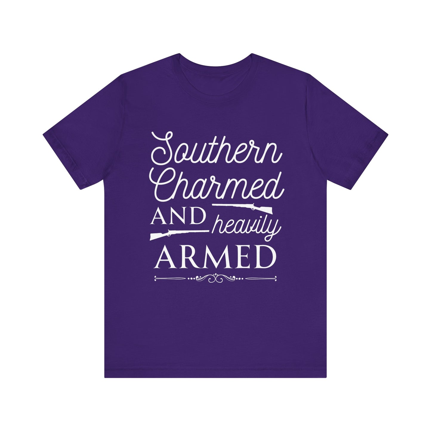 Adult unisex t-shirt stating 'Southern Charmed and Heavily Armed' in color team purple