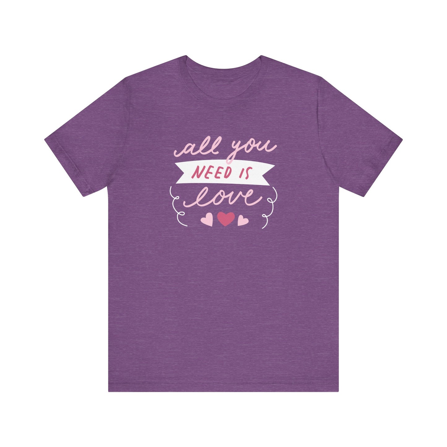 Comfortable Women's Graphic Tee Stating 'All You Need Is Love' in color heather purple