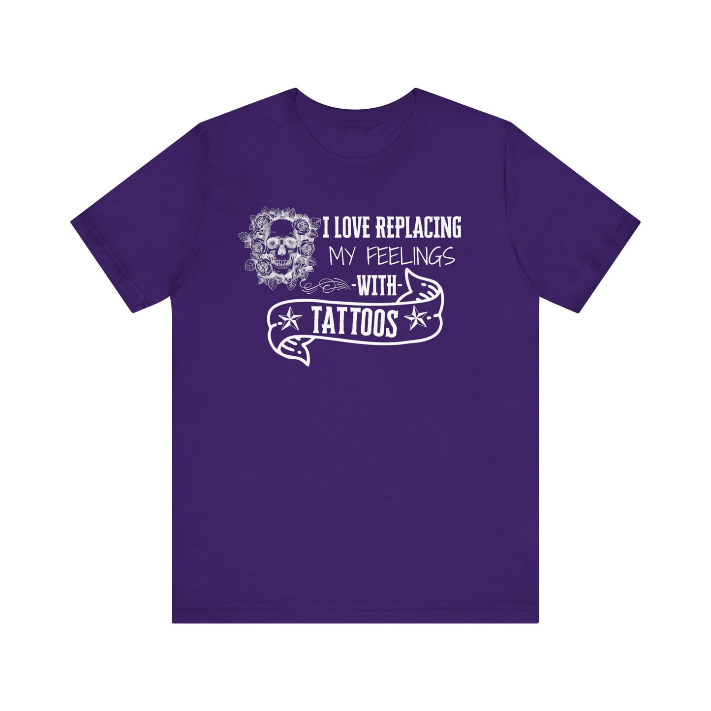 A sarcastic graphic tee stating 'I love replacing my feelings with tattoos' in color purple
