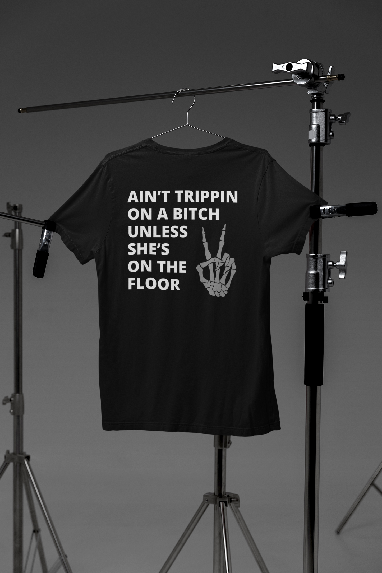 Adult Humor Graphic T-Shirt stating Ain't Trippin On a Bitch Unless She's On the Floor in color black