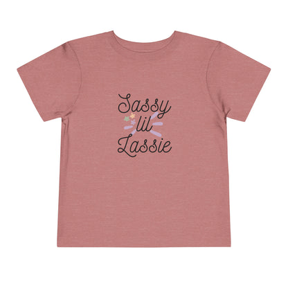 Comfortable funny graphic toddler tee stating 'Sassy Lil Lassie' in color  heather mauve