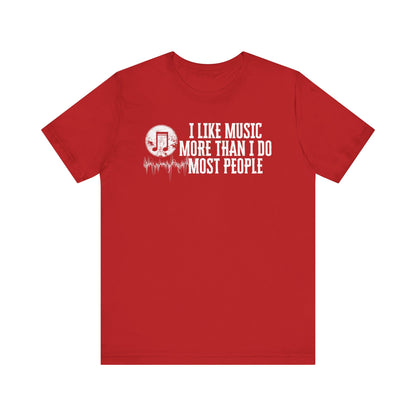 Unisex graphic cotton tee stating 'I like music more than I do most people' in color red