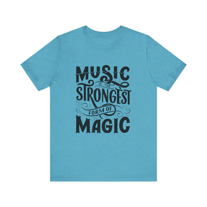 A comfortable good vibes tee stating 'Music is the strongest form of magic' in color heather aqua