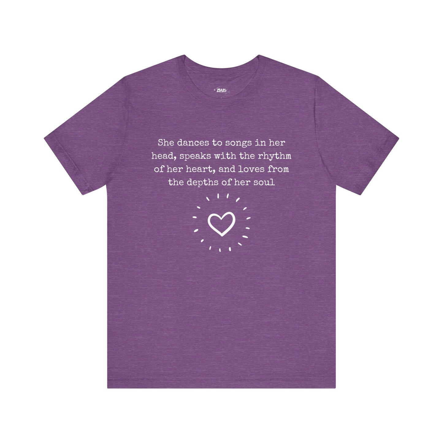 Comfortable good vibes graphic t-shirt stating 'She dances to songs in her head, speaks with the rhythm of her heart, and loves from the depths of her soul' in color team purple heather