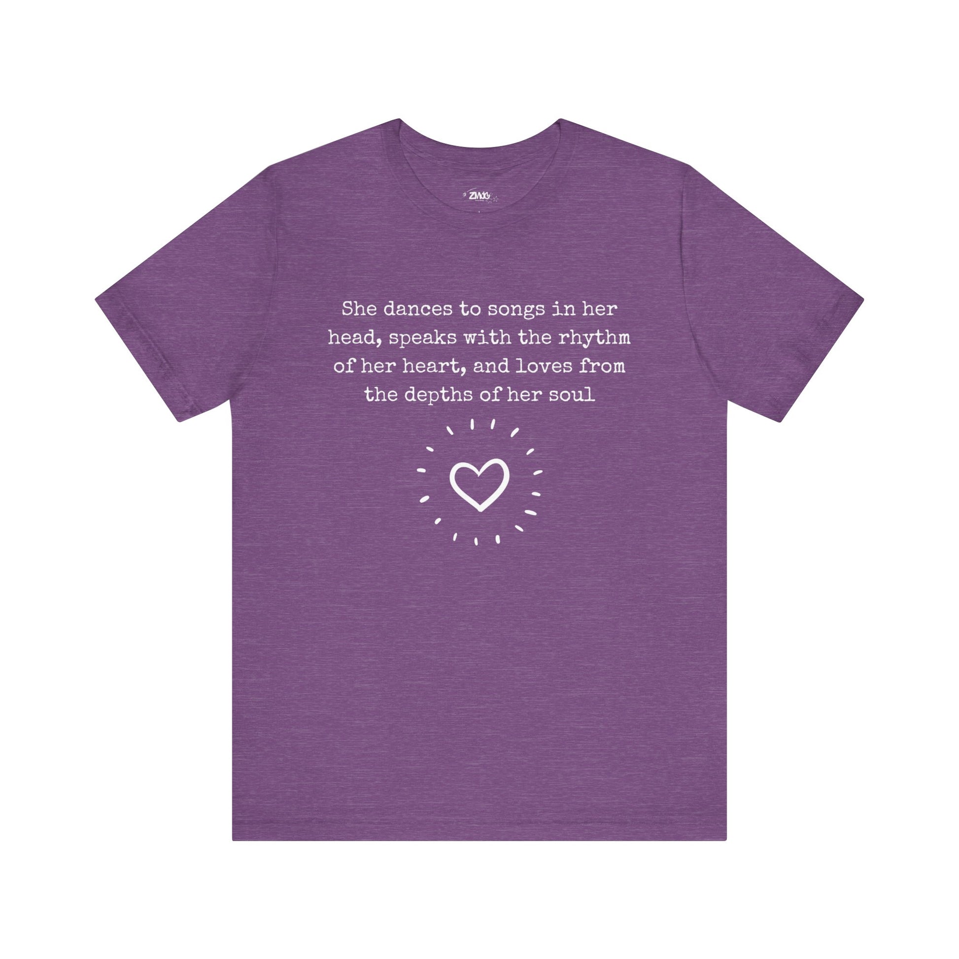 Comfortable good vibes graphic t-shirt stating 'She dances to songs in her head, speaks with the rhythm of her heart, and loves from the depths of her soul' in color team purple heather