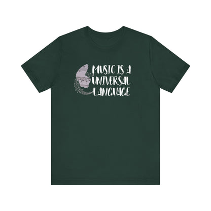 Unisex graphic good vibes tee stating 'Music is a universal language' in color forest