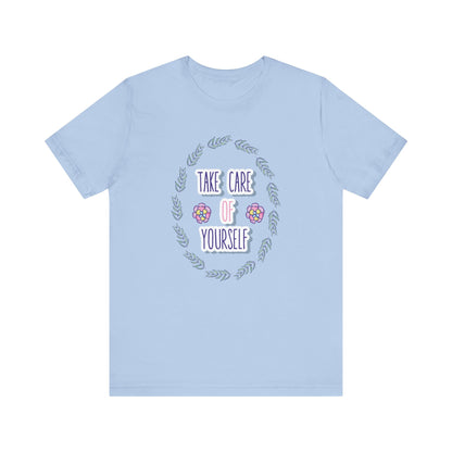 Woman's good vibe graphic tee stating 'Take Care of Yourself' in color baby blue
