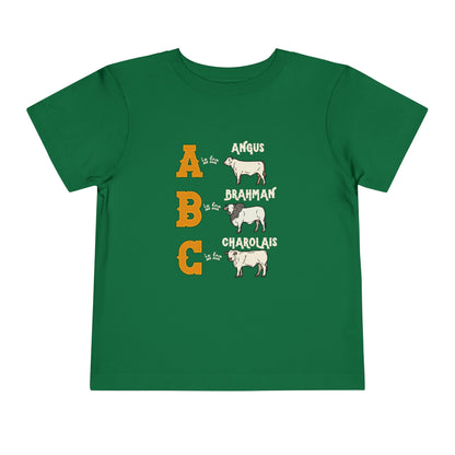 Comfy southern toddler tee stating 'A is for Angus. B is for Brahman. C is for Charolais.' in color kelly