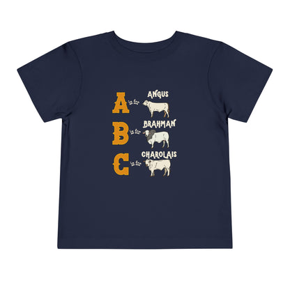 Comfy southern toddler tee stating 'A is for Angus. B is for Brahman. C is for Charolais.' in color navy