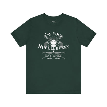 Comfortable movie quote graphic tee stating I'm Your Huckleberry - Say When in color forest