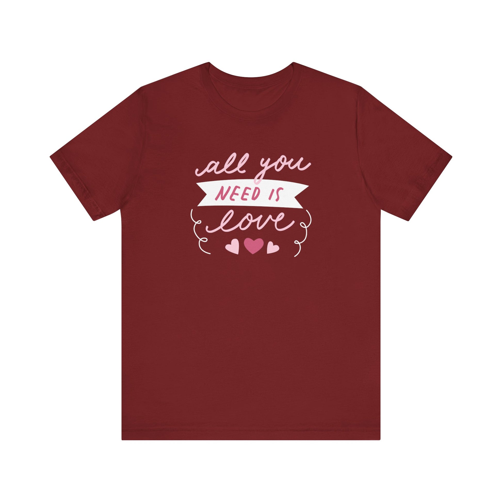 Comfortable Women's Graphic Tee Stating 'All You Need Is Love' in color maroon