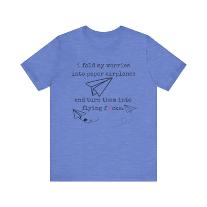 Women's adult humor t-shirt stating 'i fold my worries into paper airplanes and turn them into flying fucks' in color heather columbia blue