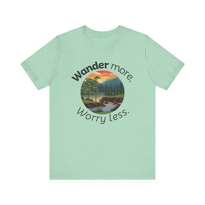 Cotton t-shirt stating 'Wander more. Worry less.' in color mint