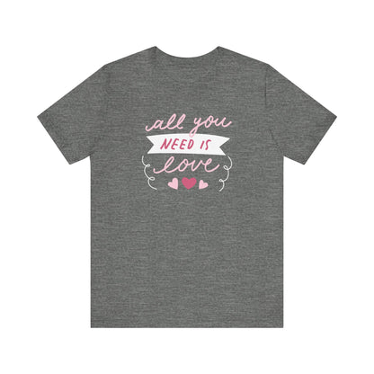 Comfortable Women's Graphic Tee Stating 'All You Need Is Love' in color deep heather