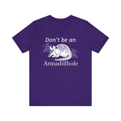 Unisex t-shirt stating 'Don't be an Armadillhole' in color team purple