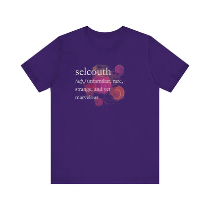 Comfortable women's good vibes tee that states 'selcouth (adj.) unfamiliar, rare, strange, and yet marvelous' in color purple