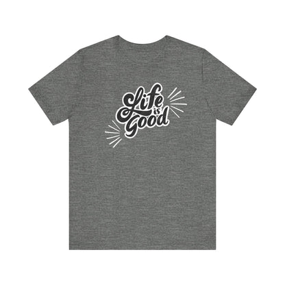 Folded cotton shirt stating 'Life is Good' in color deep heather