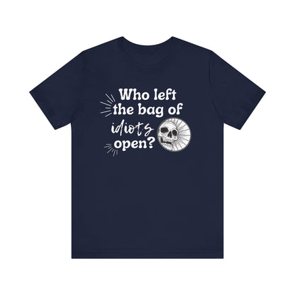 Unisex graphic tee stating 'Who left the bag of idiots open?' in color navy