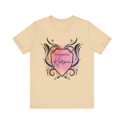 graphic tee stating Protected By Karma in color soft cream