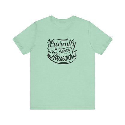 Graphic t-shirt stating 'Currently Avoiding Housework' in color mint heather