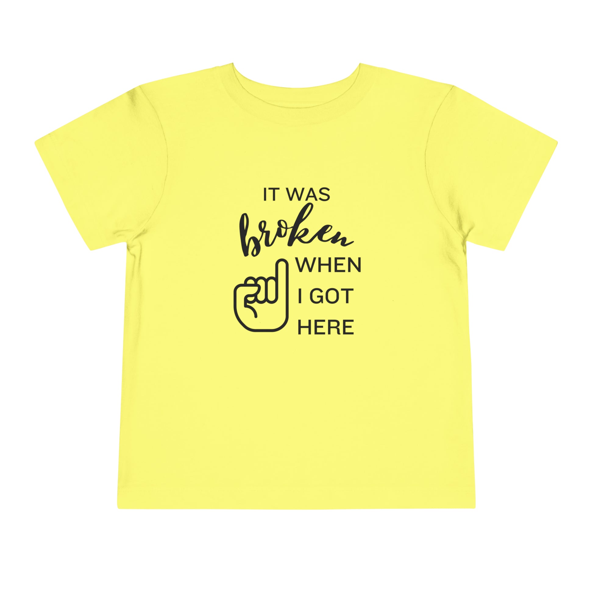 Comfortable funny graphic toddler tee stating 'It was broken when I got here' in color yellow