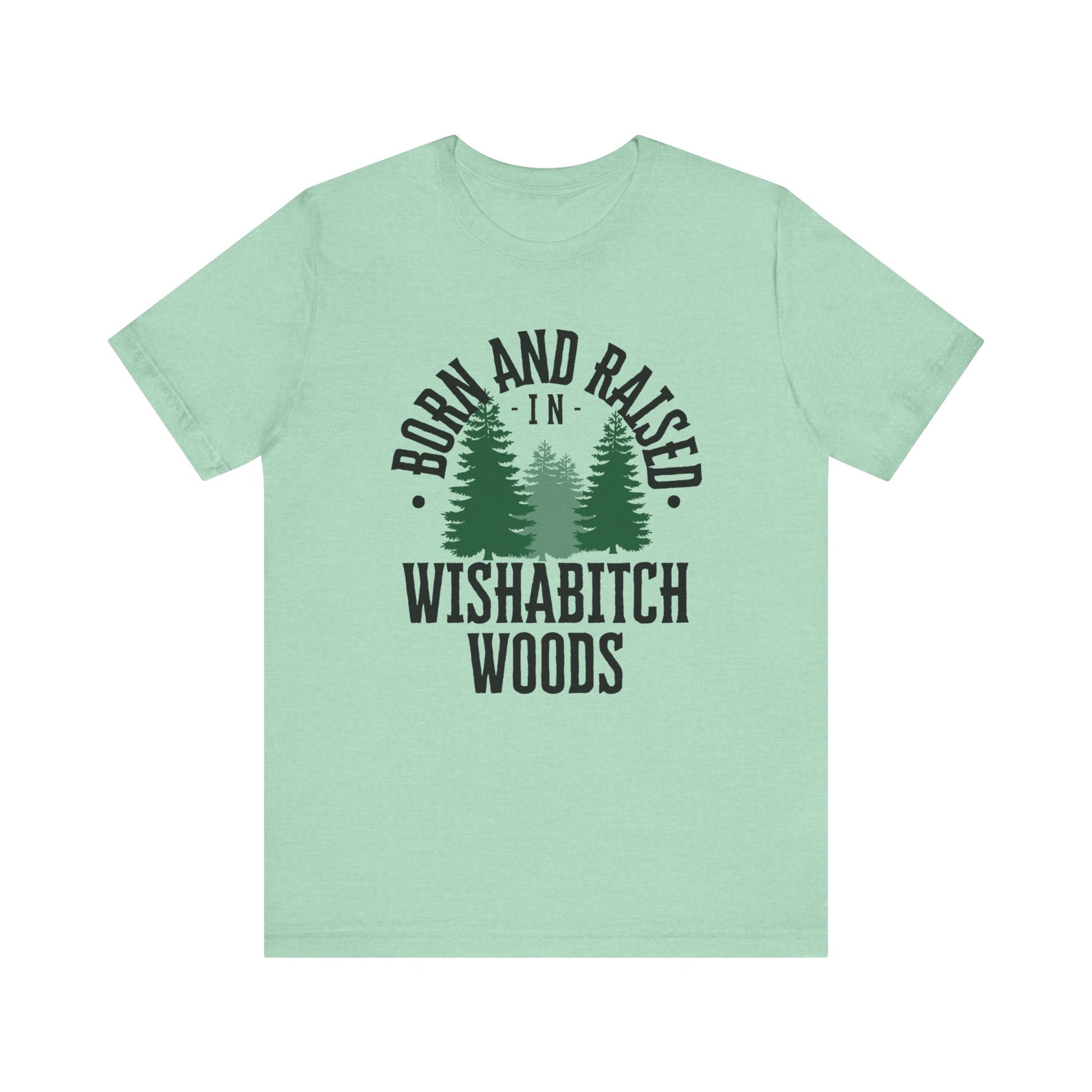 Comfortable adult humor tee stating Born and Raised in Wishab*tch Woods in color mint