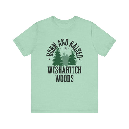 Comfortable adult humor tee stating Born and Raised in Wishab*tch Woods in color mint