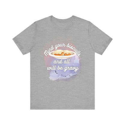 A comfortable funny southern graphic tee stating Mind You Biscuits and All will be Gravy in color athletic heather