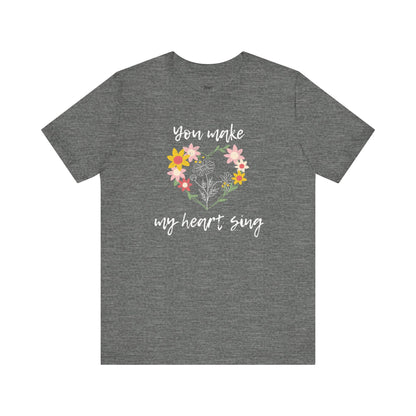 Adult graphic tee stating 'You Make My Heart Sing' in color deep heather