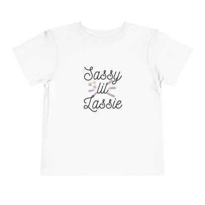 Comfortable funny graphic toddler tee stating 'Sassy Lil Lassie' in color  white