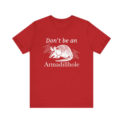 Unisex t-shirt stating 'Don't be an Armadillhole' in color red