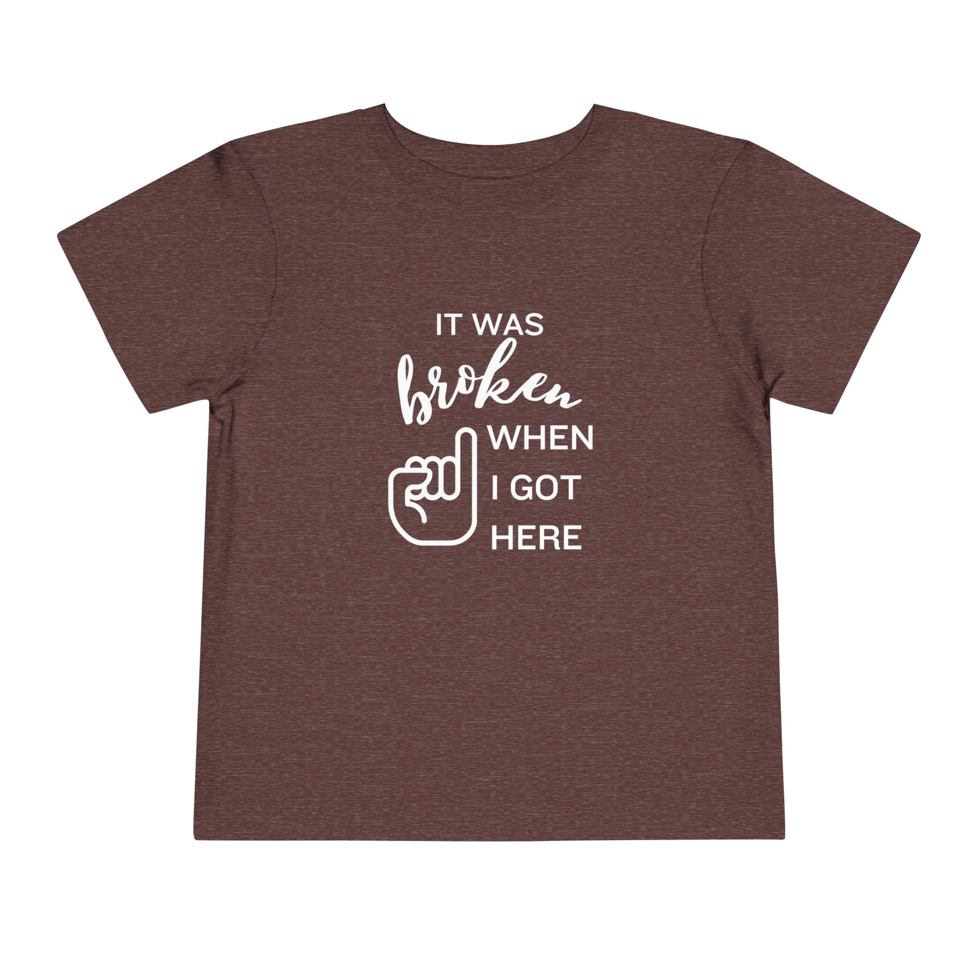 Comfortable funny graphic toddler tee stating 'It was broken when I got here' in color maroon heather