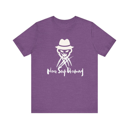 Comfortable Halloween unisex tee with Freddy Kruegar that states 'Never Stop Dreaming' in color team purple heather