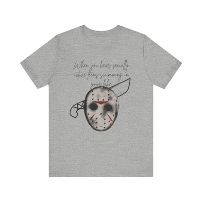Unisex Comfortable Halloween tee with Jason mask that says 'When you hear sexually active teens swimming in your lake' in color athletic heather