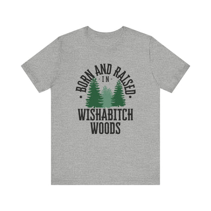 Comfortable adult humor tee stating Born and Raised in Wishab*tch Woods in color Athletic Heather