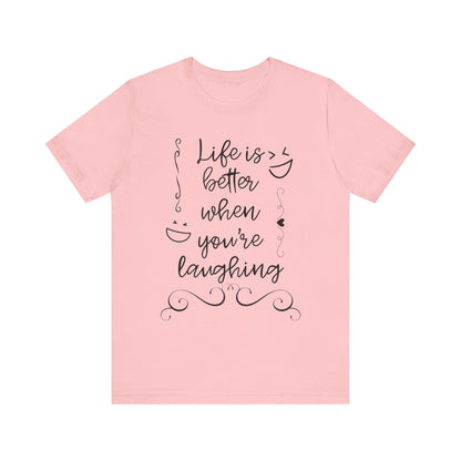 graphic t-shirt stating 'Life is better when you're laughing' in color pink