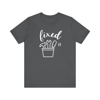Adult graphic tee stating 'Fixed It' in color asphalt