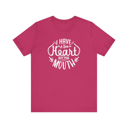 Graphic tee stating 'I have a good heart, but this mouth' in color berry