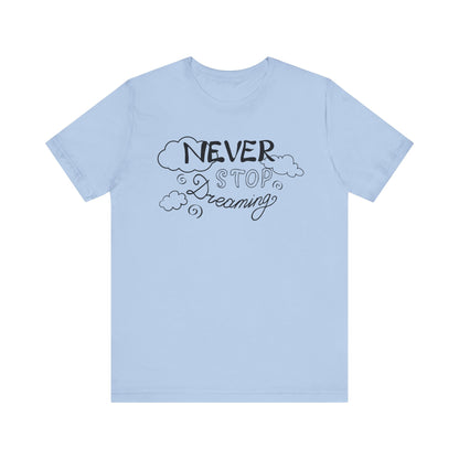 Good vibes women's tee stating 'Never Stop Dreaming' in color baby blue