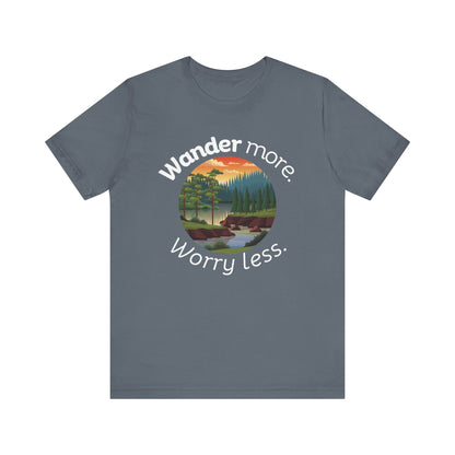 Cotton t-shirt stating 'Wander more. Worry less.' in color steel blue