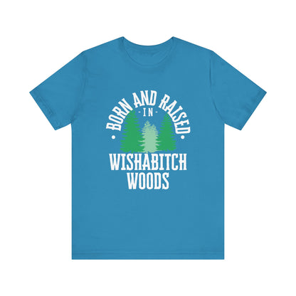 Comfortable adult humor tee stating Born and Raised in Wishab*tch Woods in color Aqua